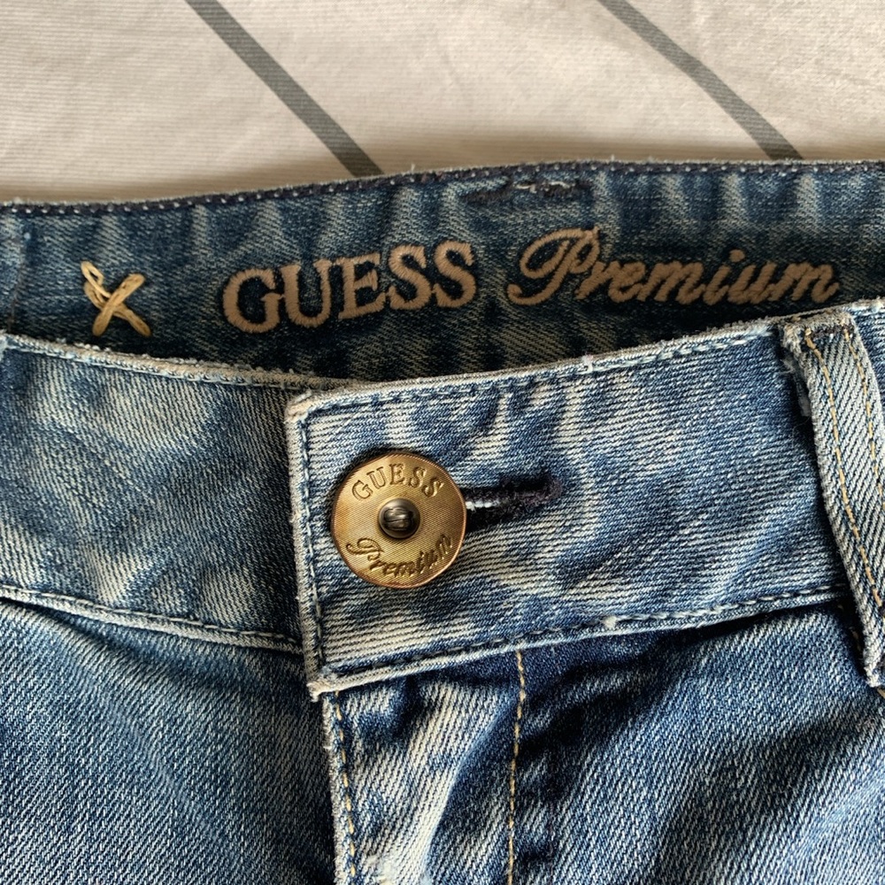 Ripped boot cut guess vintage jeans